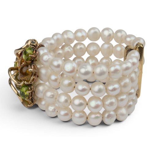 21 - Carero, A contemporary multi gem set and cultured pearl cuff braceletThe front set with cabochon and... 