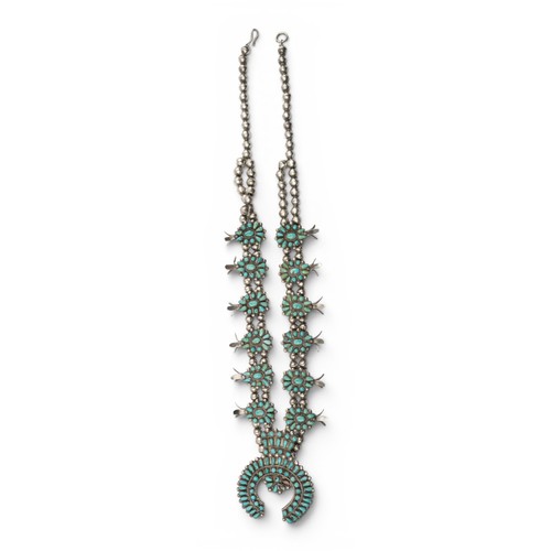 23 - American Indian, A silver and turquoise squash blossom necklaceTotal length: Approx. 65 cm.... 