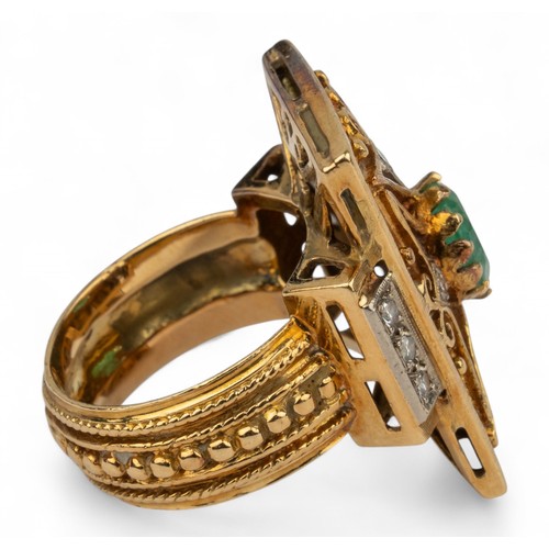 33 - An 18k gold, emerald and diamond dress ringThe rectangular top set to the centre with an oval-shaped... 