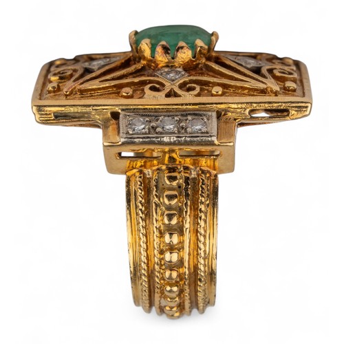 33 - An 18k gold, emerald and diamond dress ringThe rectangular top set to the centre with an oval-shaped... 