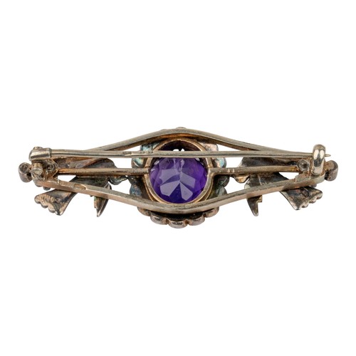 39 - Antique, An amethyst, split pearl and ruby broochThe oval-shaped mixed-cut amethyst of pretty colour... 