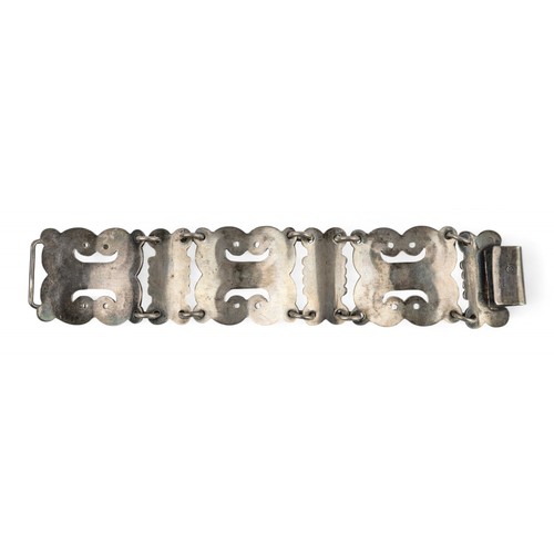 41 - Mexican, An unusual stylised silver braceletComposed of three large arch sections, with three smalle... 