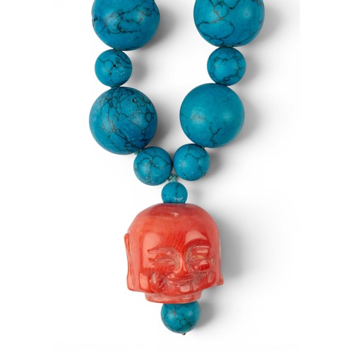 48 - Kai-Yin Lo, A turquoise-coloured bead and carved coral buddha necklaceTotal length: Approx. 55 cm.... 
