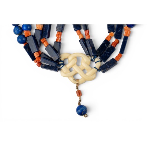 50 - Kai-Yin Lo, A lapis lazuli, coral and bone five-row bead necklaceFestooned and iced at the front wit... 