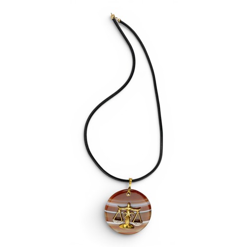 56 - An unusual diamond, gold and agate pendantThe banded agate disk applied with yellow gold scales of j... 