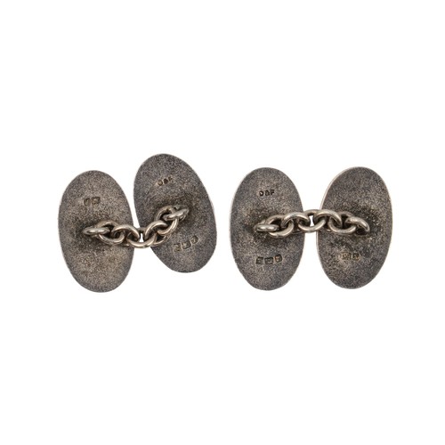 2 - AntiqueA pair of guilloche enamel and emerald silver cufflinks in Asprey's case.