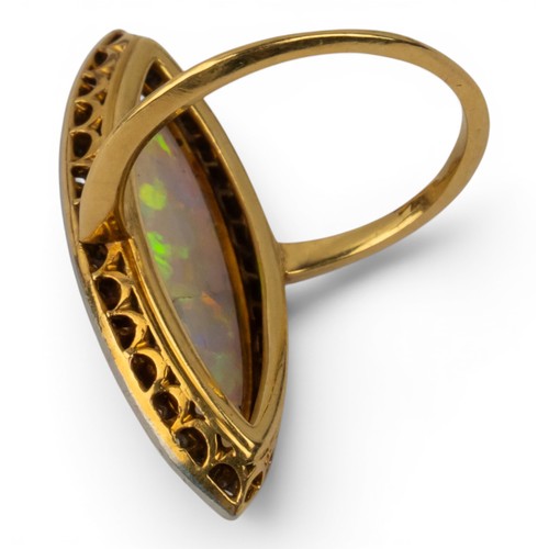 7 - Antique, A diamond and opal cluster ring, circa 1900The marquise-shaped opal within a surround of sm... 