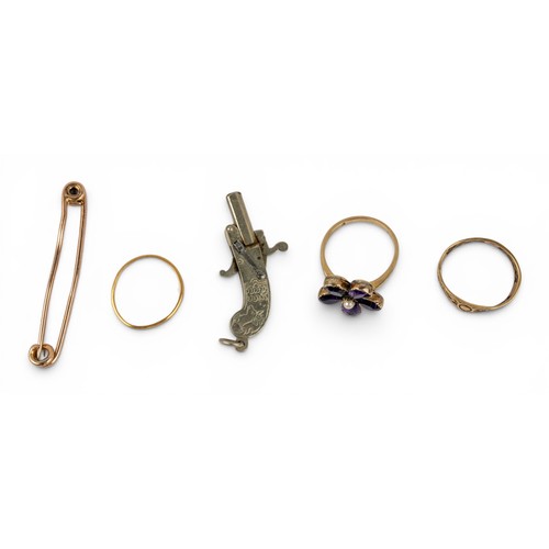 9 - A group of gold itemsTo include:[a] A Georgian-style amethyst, gold and split pearl pansy ring. Appr... 