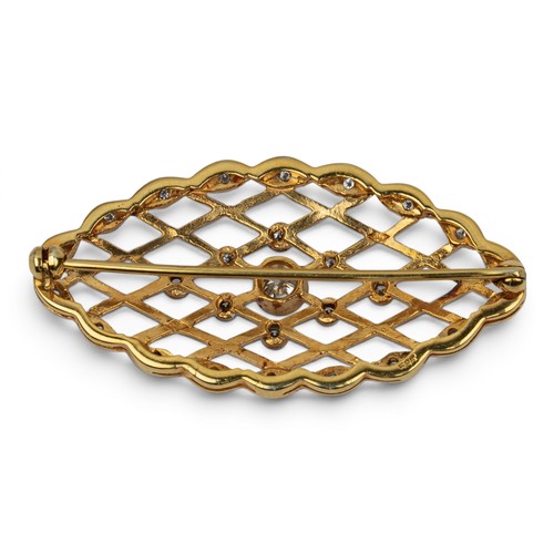 17 - A pierced lattice yellow gold and diamond broochThe lattice set with milgrain-set diamonds set to th... 