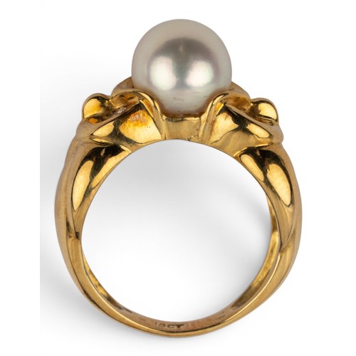 13 - An 18ct gold diamond and cultured pearl dress ringDesigned as two owls with brilliant-cut diamond ey... 