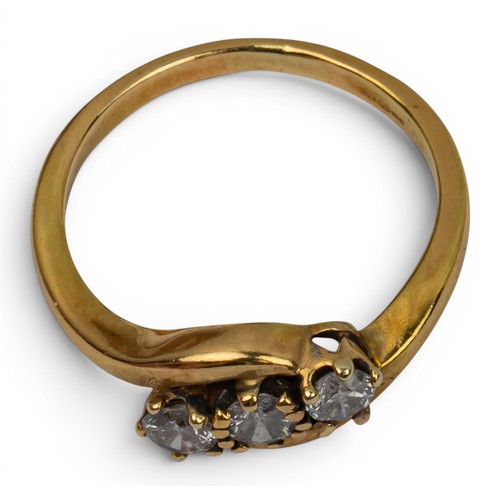 16 - An 18ct yellow gold and diamond three-stone ring, circa 1950sFinger size: PTotal weight: Approx. 4.4... 