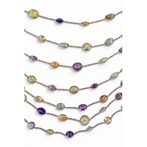 24 - A striking seven-row multi gem spectacle-set festooned chain necklaceSet throughout with citrines, a... 