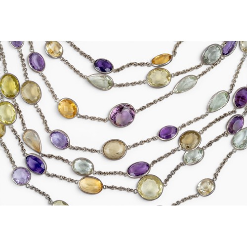 24 - A striking seven-row multi gem spectacle-set festooned chain necklaceSet throughout with citrines, a... 