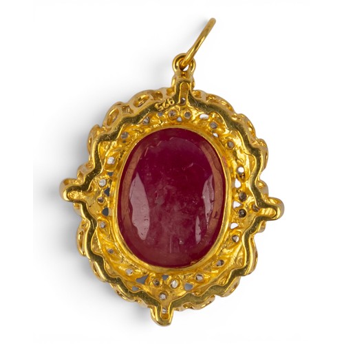 27 - A treated cabochon ruby and rose-cut diamond cluster pendantThe oval cabochon ruby set within a wrea... 
