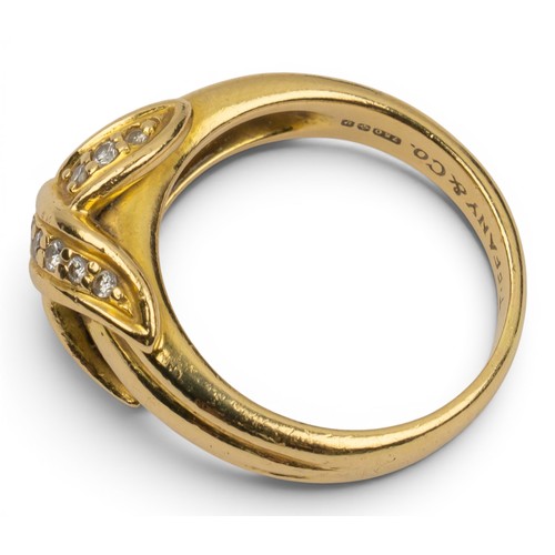 29 - Tiffany & Co, A pair of 18ct gold and diamond 'X' earrings and matching ringSigned 'T & Co' ... 