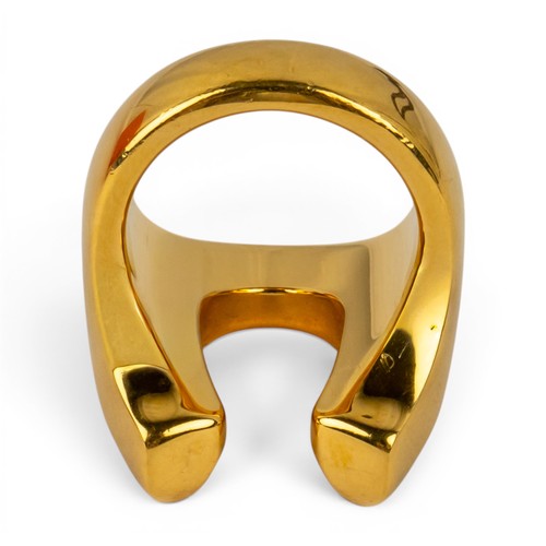 35 - Herm&egrave;s, A Jockette ringThe gold-plated and leather ring signed to the insideIn its original b... 