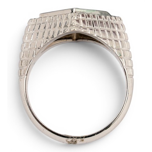 49 - An 14 ct white gold and diamond dress ring, circa 1970The lozenge-shaped top pave-set to the centre ... 