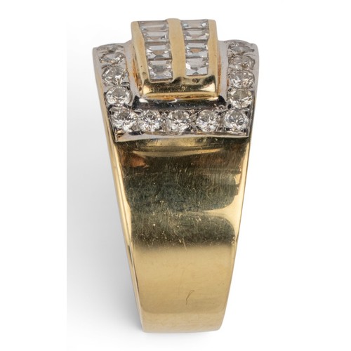 53 - An 18 ct gold and diamond dress ringThe top set with two rows of slightly graduated calibre-cut squa... 