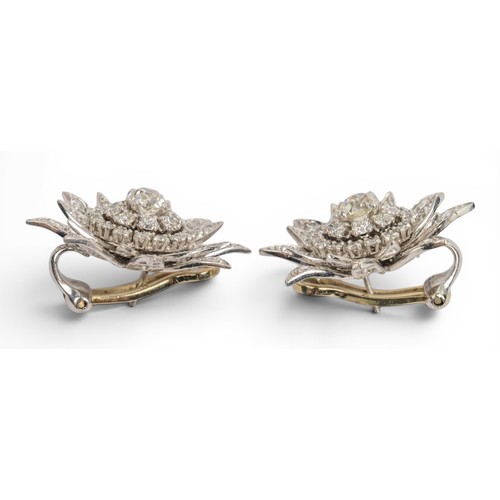 52 - French, A large pair of platinum and diamond flower ear clips, circa 1950The stylised chrysanthemum ... 