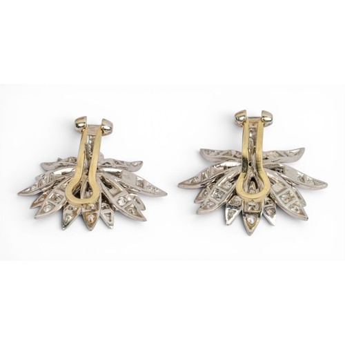 52 - French, A large pair of platinum and diamond flower ear clips, circa 1950The stylised chrysanthemum ... 