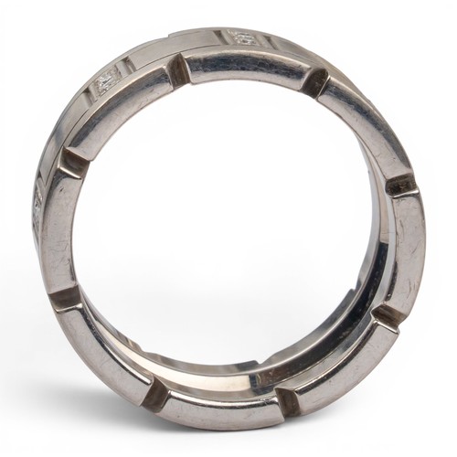 54 - Cartier, A Tank Française 18ct white gold and diamond ringThe brush-finished band set alternately wi... 