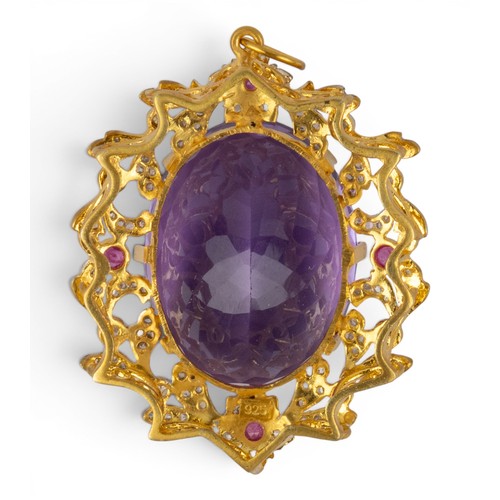 26 - Antique-style, An amethyst, diamond and ruby cluster pendantThe oval mixed-cut amethyst of pretty co... 