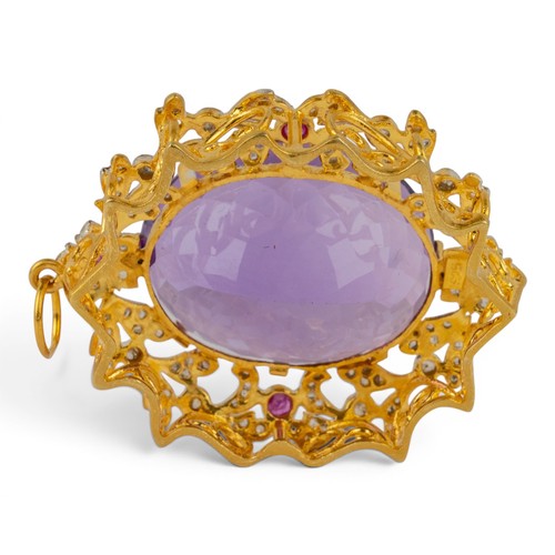 26 - Antique-style, An amethyst, diamond and ruby cluster pendantThe oval mixed-cut amethyst of pretty co... 