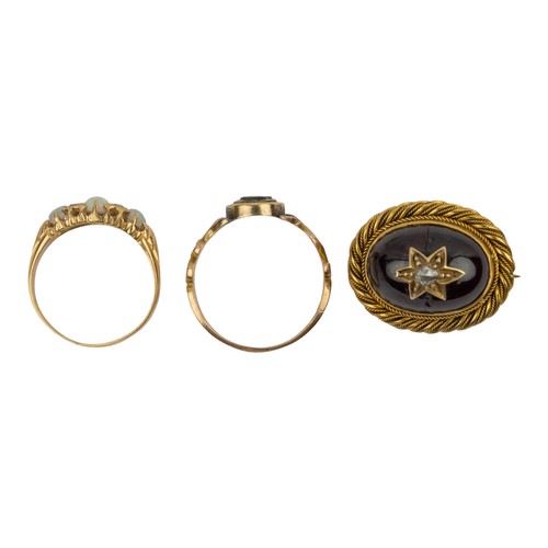 6 - Victorian, A cabochon garnet and rose-cut diamond gold-mounted star broochTogether with a small Vict... 