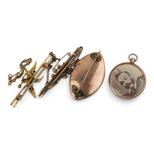 5 - Georgian, A split pearl and gold memorial hair brooch, of navette shape. Together with a yellow gold... 