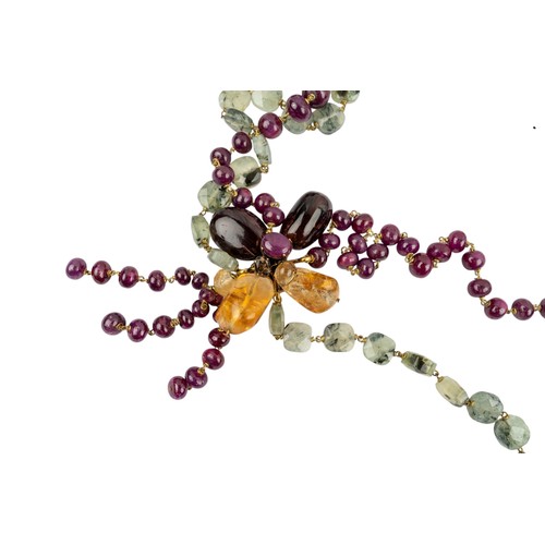 30 - Iradj Moini, A striking multi gem-set and ruby bead necklace.With cabochon smoky quartz and gem-set ... 