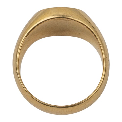 22 - An 18ct yellow gold signet ringWith family crest and 'Fides et Opera' motto engraved to the topFinge... 