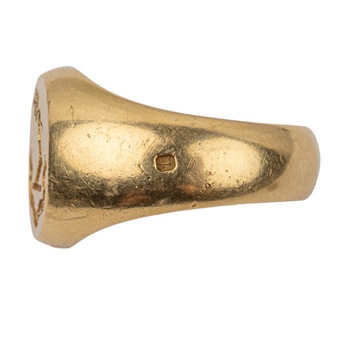 22 - An 18ct yellow gold signet ringWith family crest and 'Fides et Opera' motto engraved to the topFinge... 
