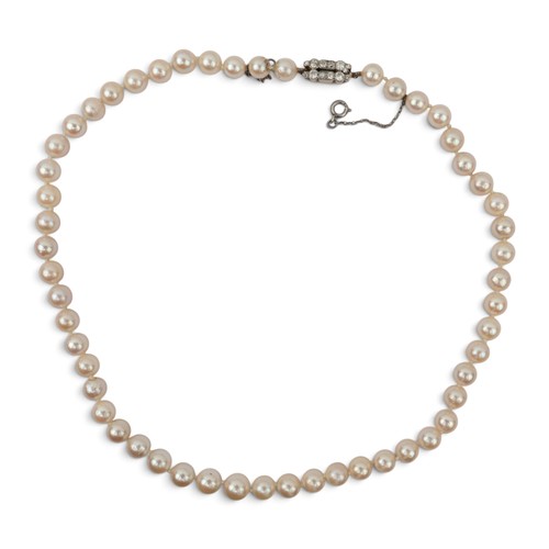 43 - A slightly graduated cultured pearl necklace with diamond clasp, circa 1930Composed of fifty-three p... 