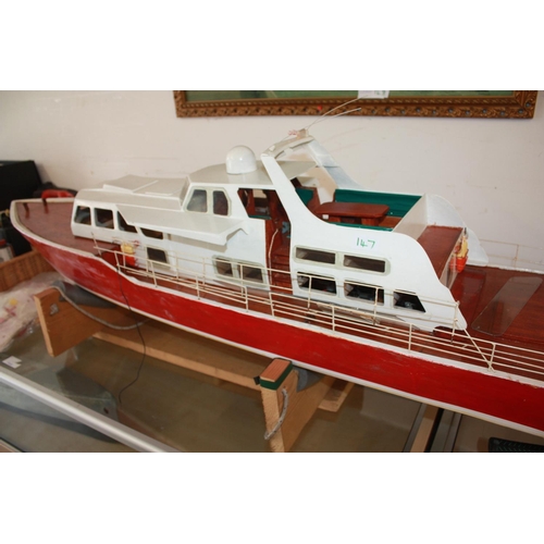 126 - Model Luxury Yacht with a Red Hull (near incomplete)