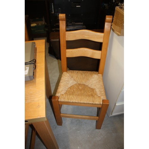 70 - Four Raffia-Seated Dining Chairs