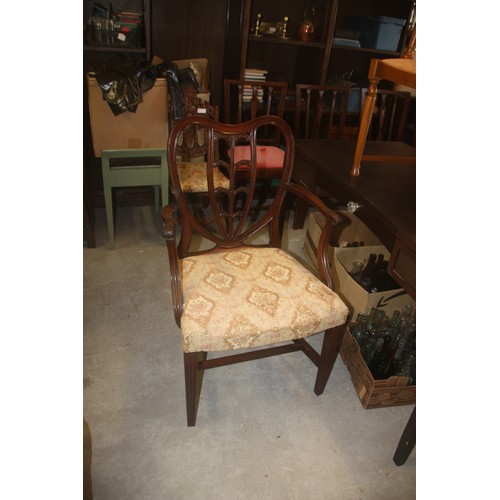 96 - Mahogany Carver Chair upholstered in a Floral Fabric.