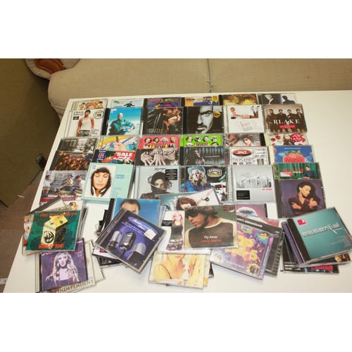 66 - Selection of approximately fifty CDs & CD singles including George Michael, Madonna, Michael Jackson... 