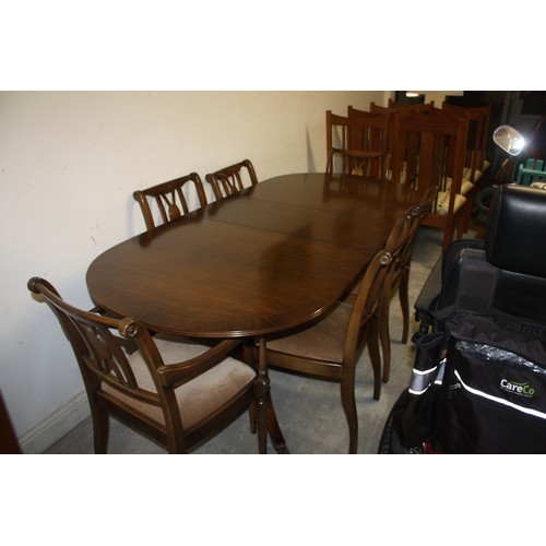 124 - Mahogany Inlaid Twin Pedestal Dining Table and Six Chairs (4 + 2 Carvers) with Upholstered Seats