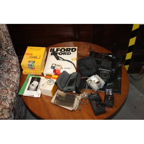 68 - Assorted Photographic Items including Photographic Paper, Flash Guns, etc.,