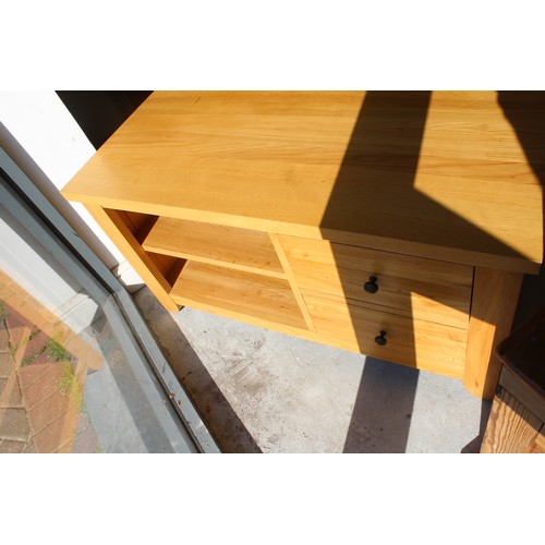 16 - Light Waxed Solid Oak Television Stand having Two Drawers - approx. 40
