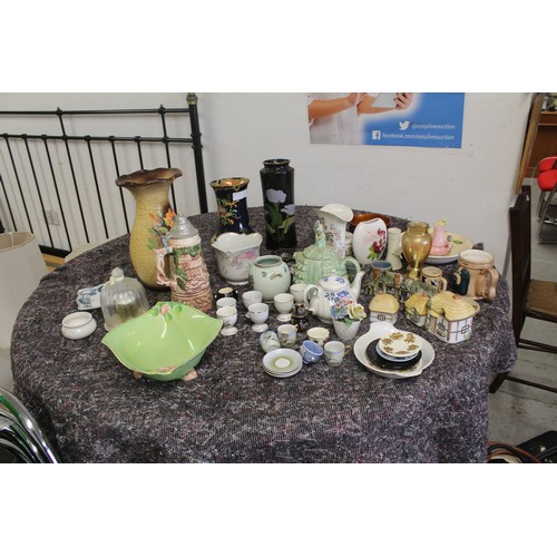 36 - Four Shelves of Assorted Bric-a-Brac including Royal Winton Vase and Bowl, Cottage Ware and a Stonew... 