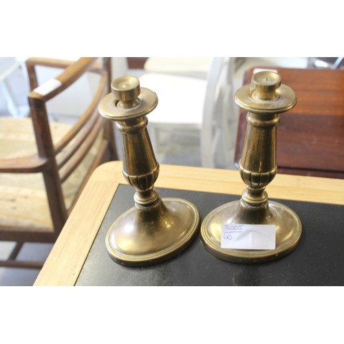 19 - Pair of Brass Candle Sticks having an Oval Base approx. 6