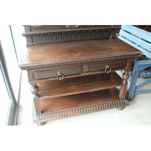 190 - Dark Oak Victorian Buffet on Short Cabriole Legs terminating on Bun Feet.
48