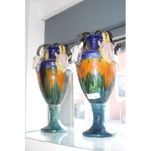 28 - Pair of Tall Majolica Urns adorned with Four Handles supported by Goats Heads - approx 18
