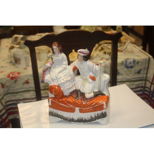 237 - Staffordshire Flat Ware Figure (Man, Woman and Bird)