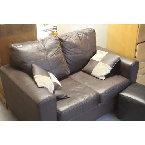 57 - Small Two-Seater Sofa in Brown Leather Plus a Pouffe and Two Scatter Cushions