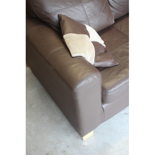 57 - Small Two-Seater Sofa in Brown Leather Plus a Pouffe and Two Scatter Cushions