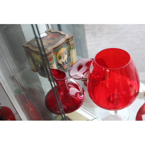 208 - Three Items of Coloured Glass: a Jug, a Flower Vase and a Brandy Glass