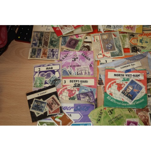 17 - Approximately Fifty  Philatelic retailer's packs from the early 1960s (mainly un-opened)