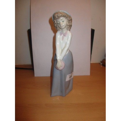 189 - Nao by Ladro Porcelain Figure. Girl in Green Hat and Blue Skirt Holding Handbag. 1990